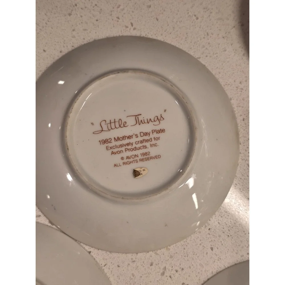 Set of 8 Avon Collectable Plates 1980s